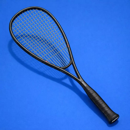 Black squash racket with Ashaway SuperNick XL Titanium strings on a blue background