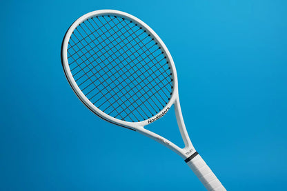 Nordicdots Model 100 tennis racket in white with Nordicfots TS127 strings in black, with a blue background and anti clockwise racket orientation to the left