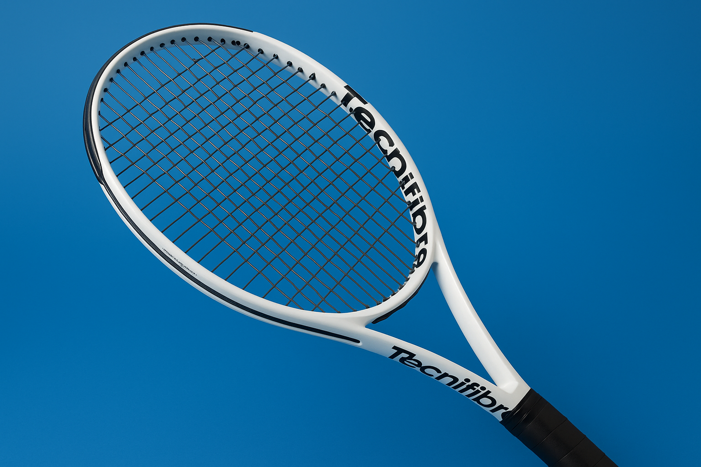 Tecnifibre tennis racket with Tecnifibre Razor Soft strings on a blue background
