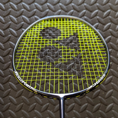 Yonex badminton racket restrung with Yonex BG80 string in yellow with black stencil