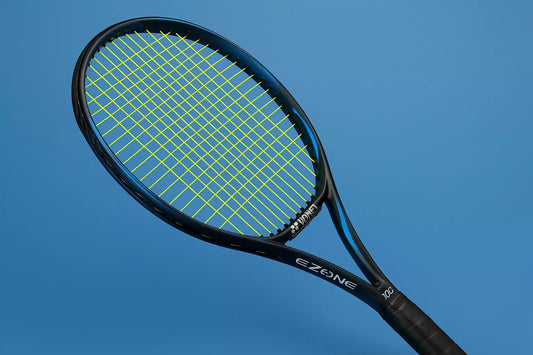Yonex Ezone 100 tennis racket with Yonex Poly Tour Pro strings in yellow, on a blue background